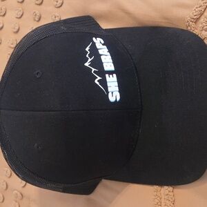 She BRAPS Black Trucker Hat